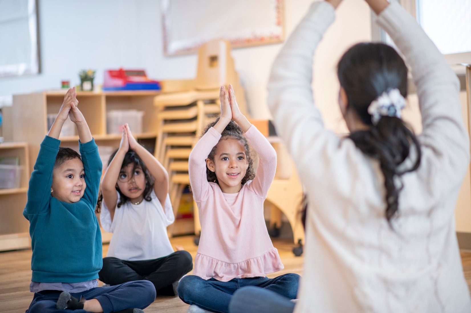 Daycare Children Doing Yoga stock photo